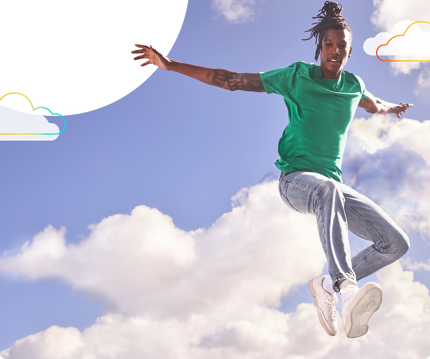 Image of a male model jumping in clouds