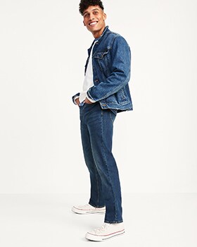 A model wears Straight style jeans, a denim jacket over a white top
