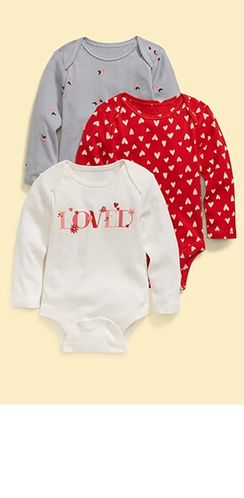 A layout of three bodysuits in solids and patterns.