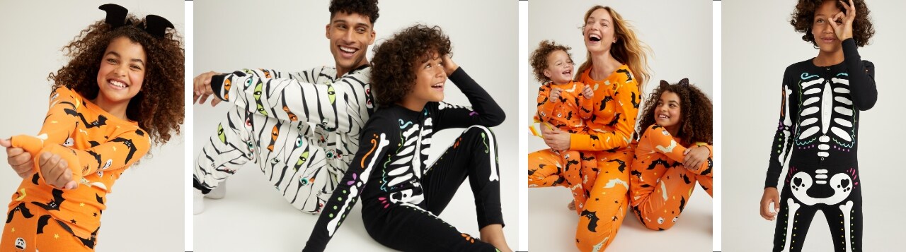 A range of family models are dressed in clothing from Old Navy's Halloween family matching collection.