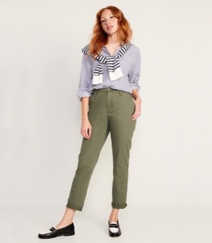 A female model wearing green colored OGC Straight style pants