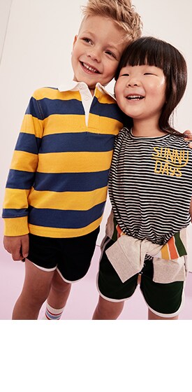 A young male model wearing uniform piewue polo shirt and short and female model wearing stripped top and short.