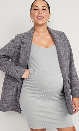 A maternity model wears a gray colored Rib-Knit Bodycon Dress