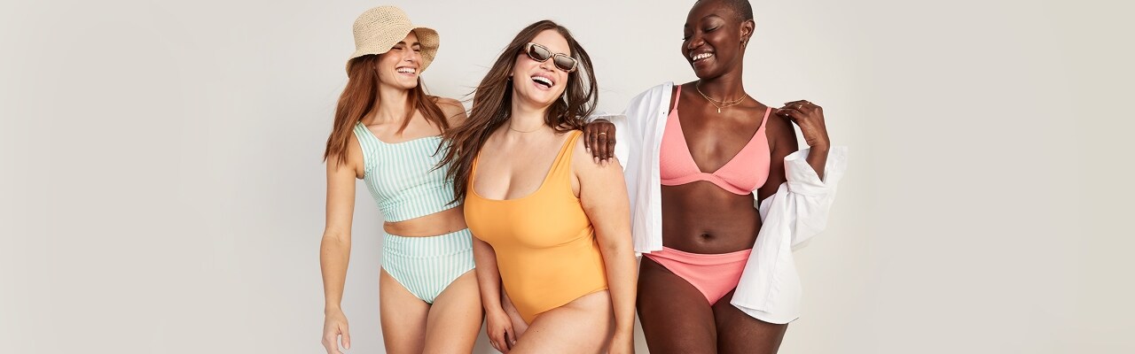 Three female models wear swimsuits from Old Navy's collection in different colours and styles.