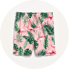 A pair of tropical Printed 7" inseam Swim Trunks for Men.