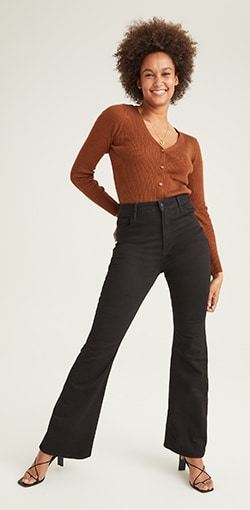 High waisted dark jeans with leg flare.