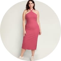 Female model wearing pink fitted halter midi dress for women.