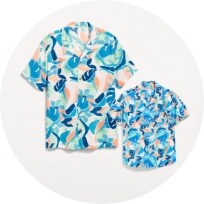 Image of family-matching tropical printed button down shirt.