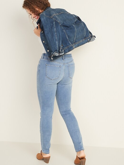 Image number 7 showing, Mid-Rise Pop Icon Skinny Distressed Jeans for Women