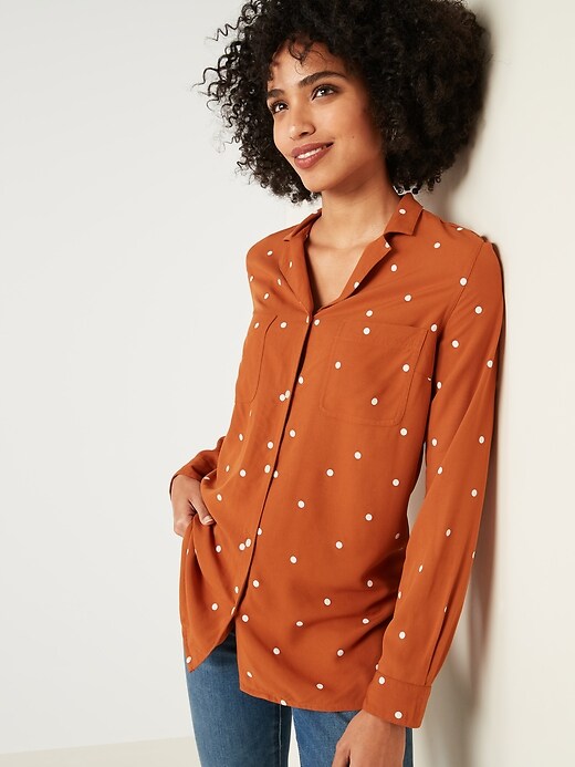 orange and white polka dot shirt