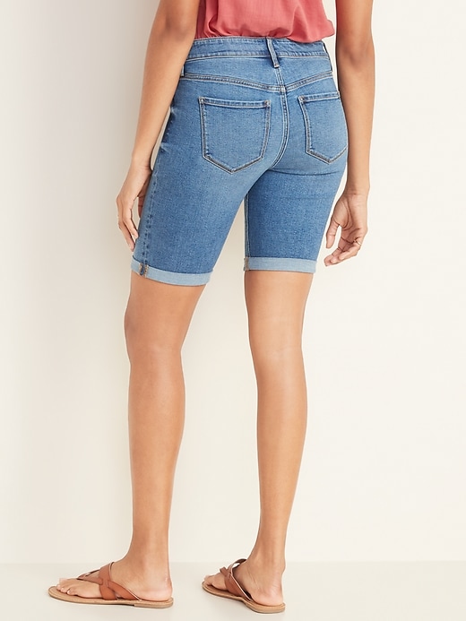 View large product image 2 of 3. Mid-Rise Cuffed Bermuda Slim Jean Shorts for Women -- 9-inch inseam