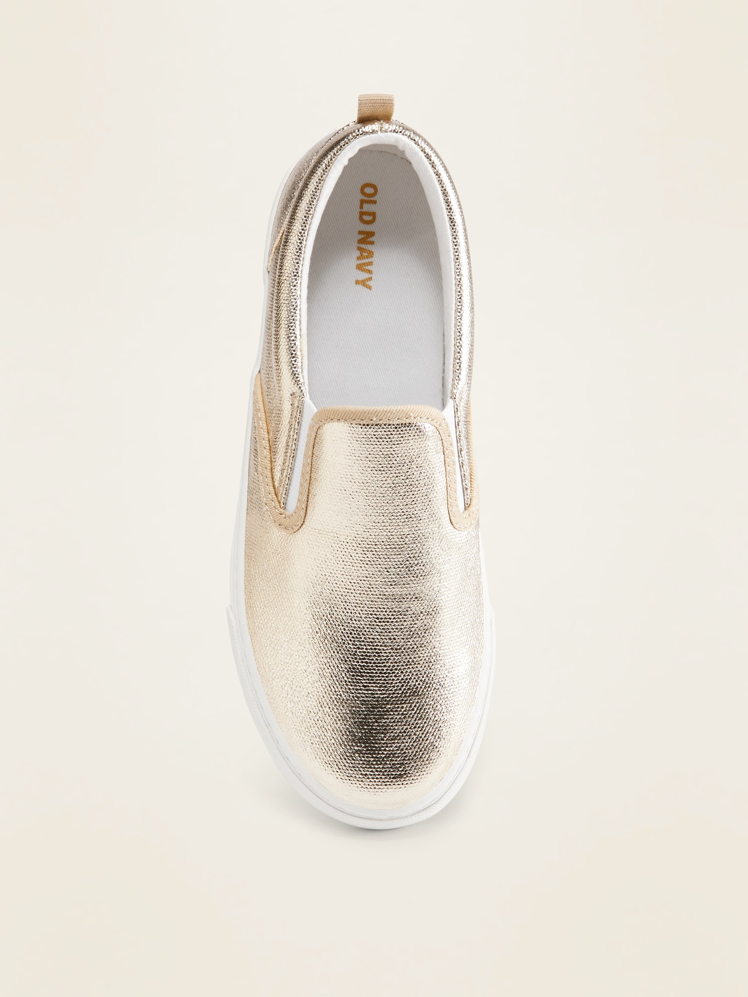 gold slip on sneakers