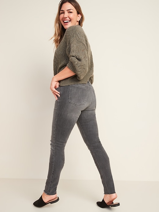 Image number 7 showing, Mid-Rise Rockstar Super Skinny Ripped Gray Cut-Off Jeans for Women