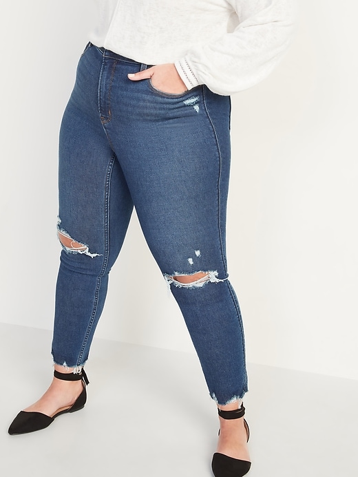 Image number 1 showing, Extra High-Waisted Secret-Slim Pockets Plus-Size Rockstar 360° Stretch Super Skinny Ripped Jeans