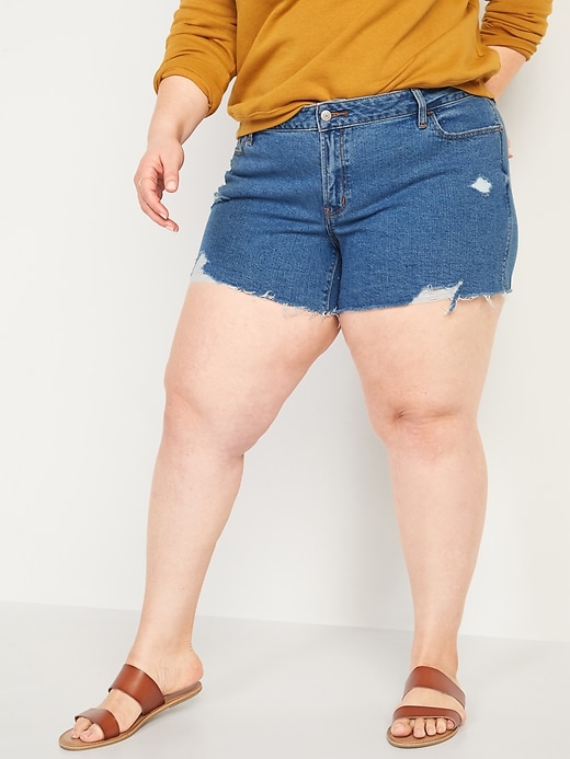Image number 1 showing, Mid-Rise Boyfriend Plus-Size Ripped Cut-Off Jean Shorts -- 5-inch inseam