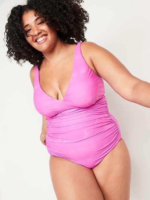 Old Navy Deep V-Neck Underwire Secret Slim Ruched Plus-Size One-Piece Swimsuit. 1