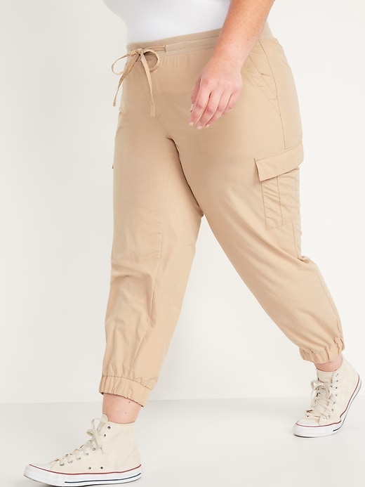 View large product image 1 of 3. Mid-Rise Rib-Knit Waist Soft-Woven Plus-Size Cargo Jogger Pants