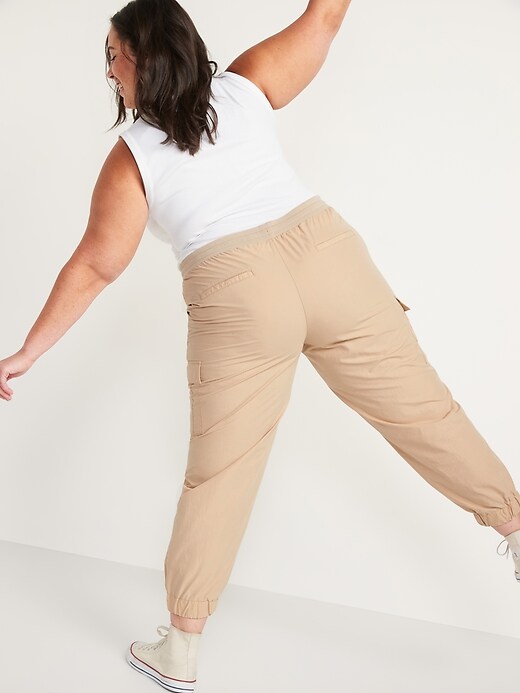 View large product image 2 of 3. Mid-Rise Rib-Knit Waist Soft-Woven Plus-Size Cargo Jogger Pants