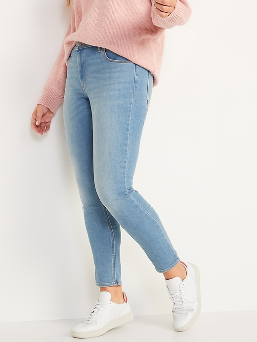 Image number 1 showing, Mid-Rise Light-Wash Skinny Jeans for Women