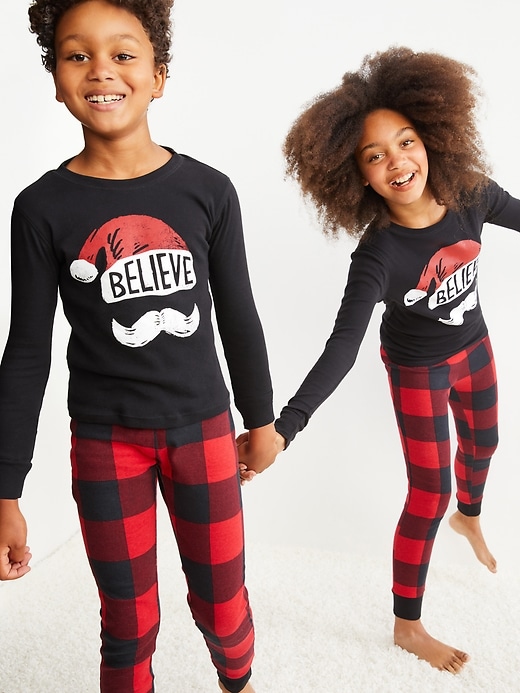 Old Navy Gender-Neutral Holiday Matching Graphic Snug-Fit Pajama Set For Kids. 1