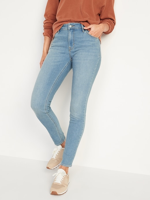 Image number 5 showing, Mid-Rise Light-Wash Skinny Jeans for Women