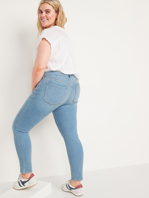 Image number 8 showing, Mid-Rise Light-Wash Skinny Jeans for Women