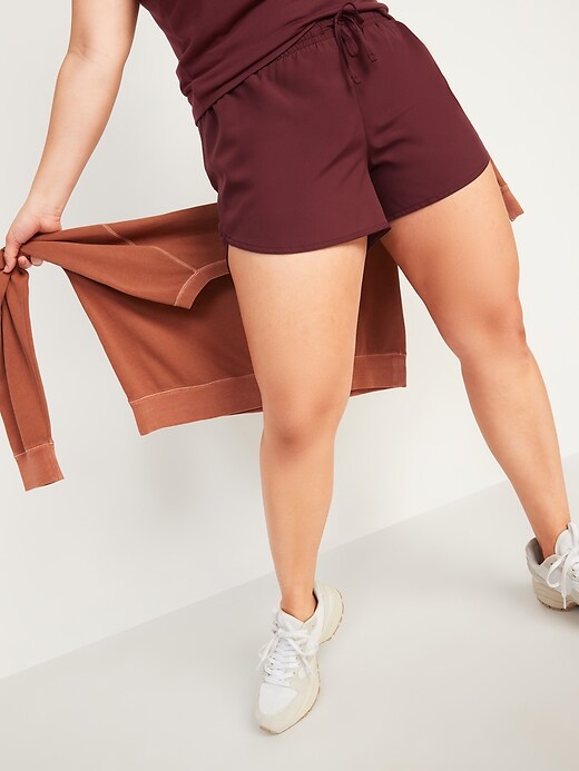 Image number 1 showing, Mid-Rise Dolphin-Hem Run Shorts for Women -- 3-inch inseam