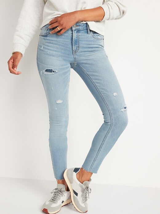 Image number 1 showing, Mid-Rise Rockstar Super-Skinny Ripped Ankle Jeans for Women