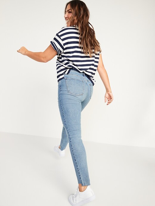 Image number 6 showing, Mid-Rise Rockstar Super-Skinny Ripped Cut-Off Ankle Jeans for Women