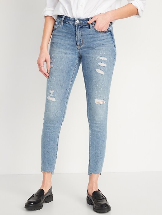 Image number 1 showing, Mid-Rise Rockstar Super-Skinny Ripped Cut-Off Ankle Jeans for Women