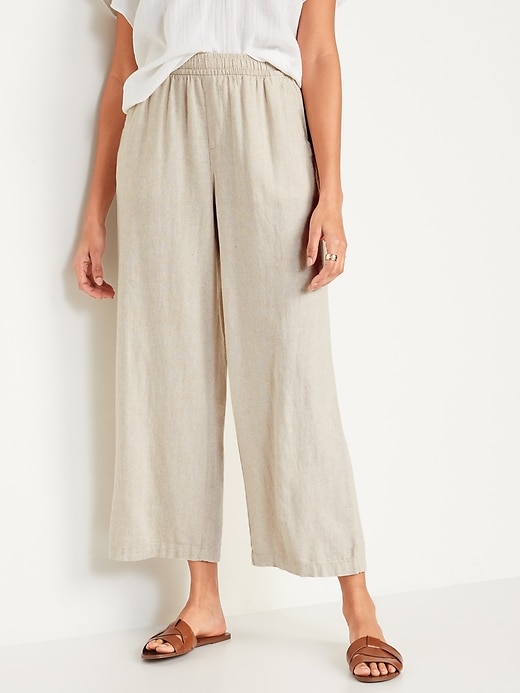 L'image numéro 1 présente Pantalon en mélange de lin à taille haute et à jambe large pour Femme