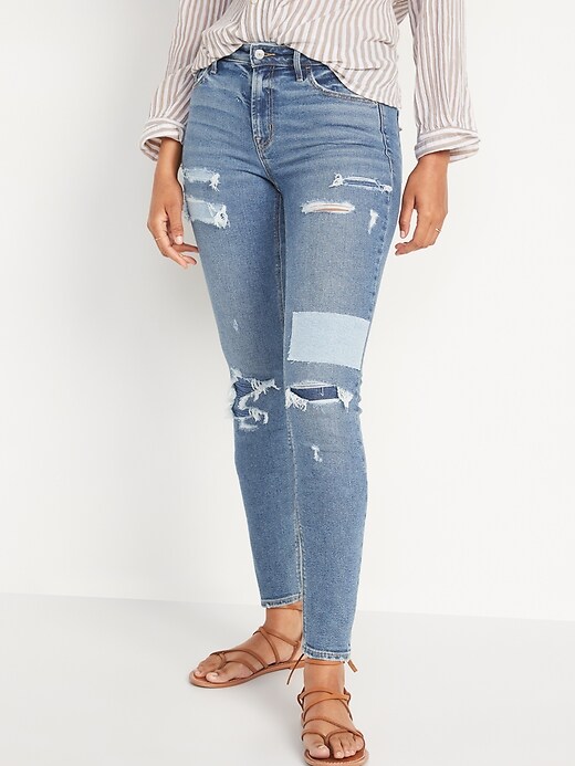 Old Navy Mid-Rise Rockstar Super-Skinny Patchwork Ripped Jeans for Women. 1