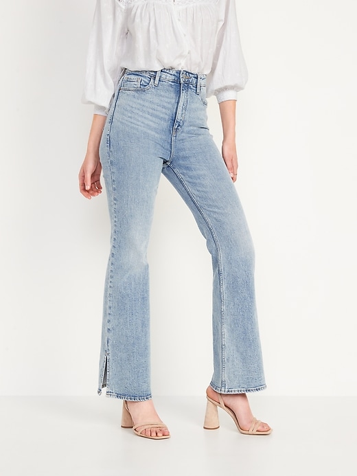 Jeans avec fente sur le online cote