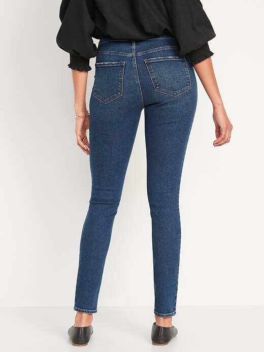 Image number 2 showing, Mid-Rise Rockstar Super-Skinny Ripped Jeans for Women