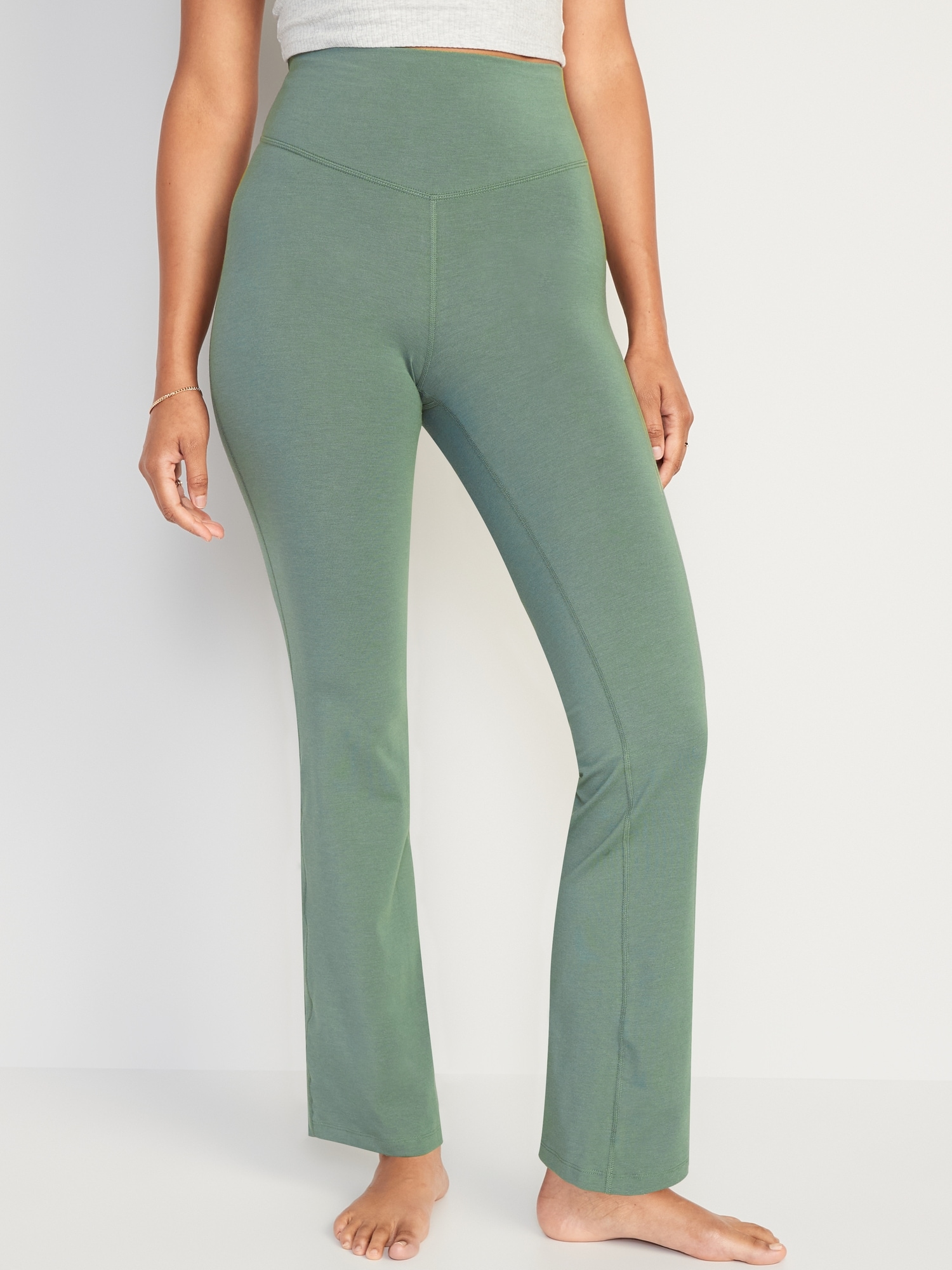 Old Navy Extra High-Waisted PowerChill Slim Boot-Cut Pants green. 1