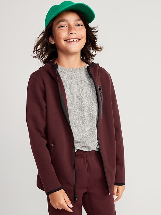 L'image numéro 1 présente Haut à capuchon et à glissière en molleton dynamique pour Garçon