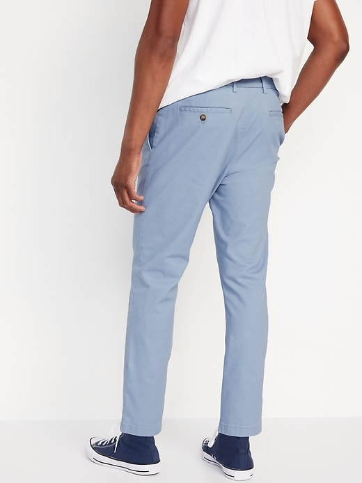 L'image numéro 6 présente Chino ample effilé à Extensibilité intégrée et à plis longueur cheville pour Homme