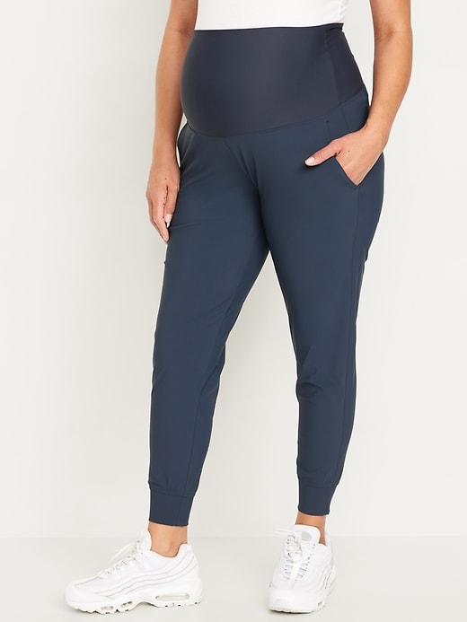 L'image numéro 1 présente Pantalon de jogging Tech élégant à taille rabattable de maternité