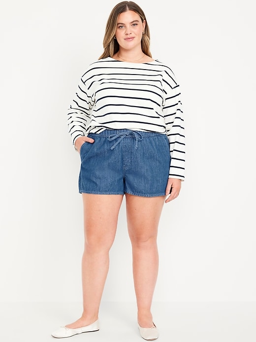 Image number 7 showing, High-Waisted Baggy Jean Shorts