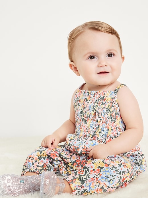 View large product image 1 of 1. Printed Sleeveless Smocked Jumpsuit for Baby