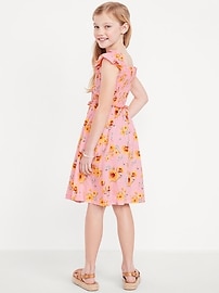 Image number 2 showing, Printed Flutter-Sleeve Smocked Fit and Flare Dress for Girls
