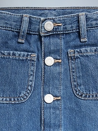 L'image numéro 2 présente Jupe d’anniversaire en denim à taille haute boutonnée sur le devant pour toute-petite fille