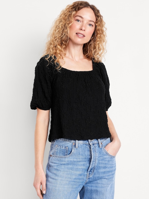 Haut en dentelle à manches bouffantes
