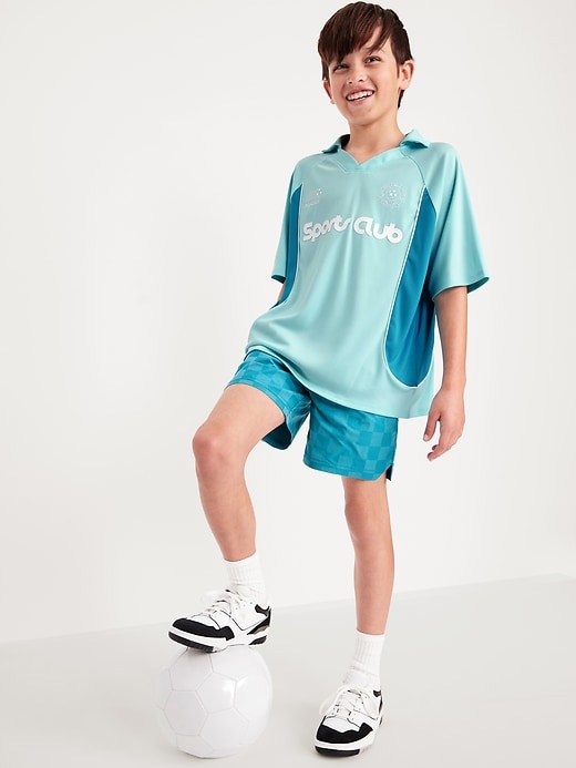 View large product image 1 of 3. Oversized Collared Graphic Performance Top for Boys