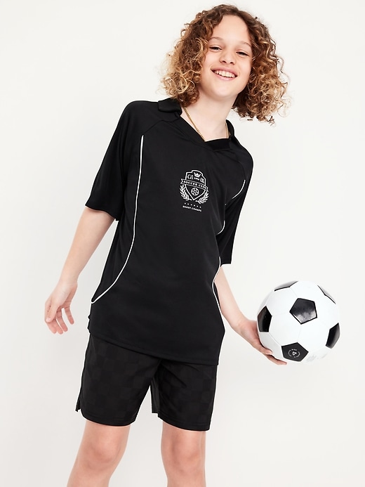 View large product image 1 of 3. Oversized Collared Graphic Performance Top for Boys