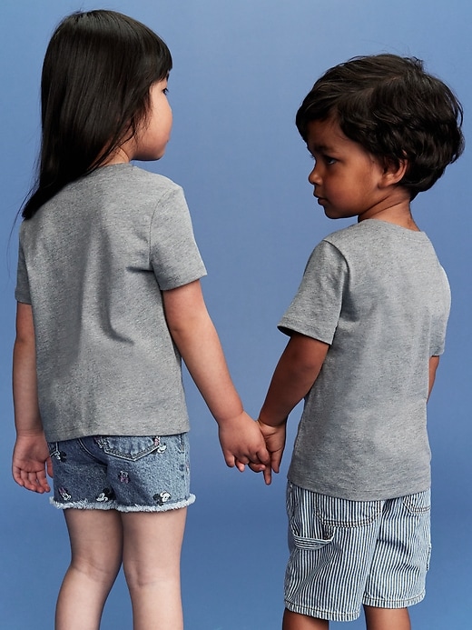 View large product image 2 of 3. Old Navy x Disney© Unisex Flag Logo-Graphic T-Shirt for Toddler