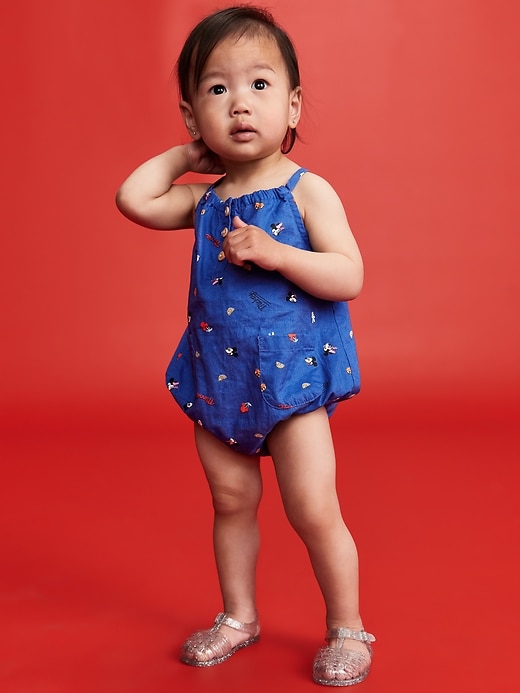 View large product image 1 of 5. Old Navy x Disney© Sleeveless Henley One-Piece Graphic Romper for Baby