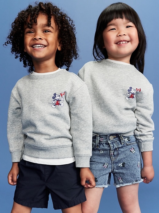 View large product image 1 of 4. Old Navy x Disney© Mickey Mouse Oversized Unisex Flag Logo-Graphic Sweatshirt for Toddler