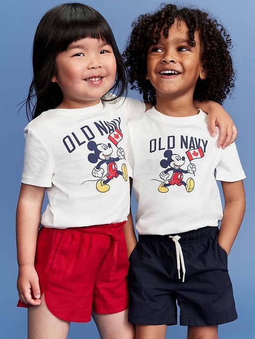 View large product image 1 of 3. Old Navy x Disney© Mickey Mouse Unisex Flag Logo-Graphic T-Shirt for Toddler