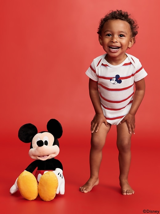 View large product image 1 of 4. Old Navy x Disney© Mickey Mouse Graphic Bodysuit for Baby